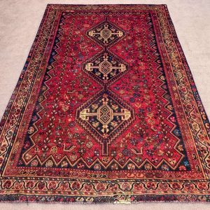 Vintage Afghan handmade wool area rug with red, beige, and blue geometric patterns – 5.7 x 8.10 ft