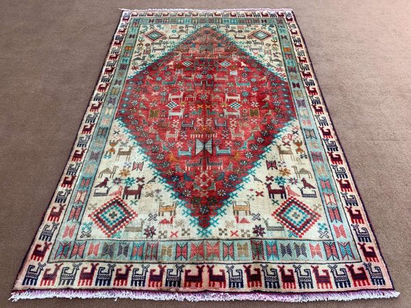 Vintage Afghan Handmade Wool Rug showing full view in beige and multi-color pattern.