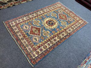 Handmade Afghan Runner Rug in rich red with geometric patterns