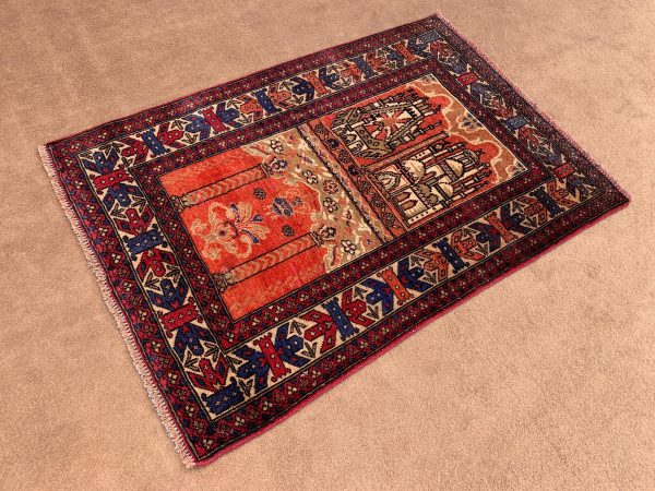 Vintage Red Afghan Kilim Rug 2.7x9.1 Ft on a wooden floor