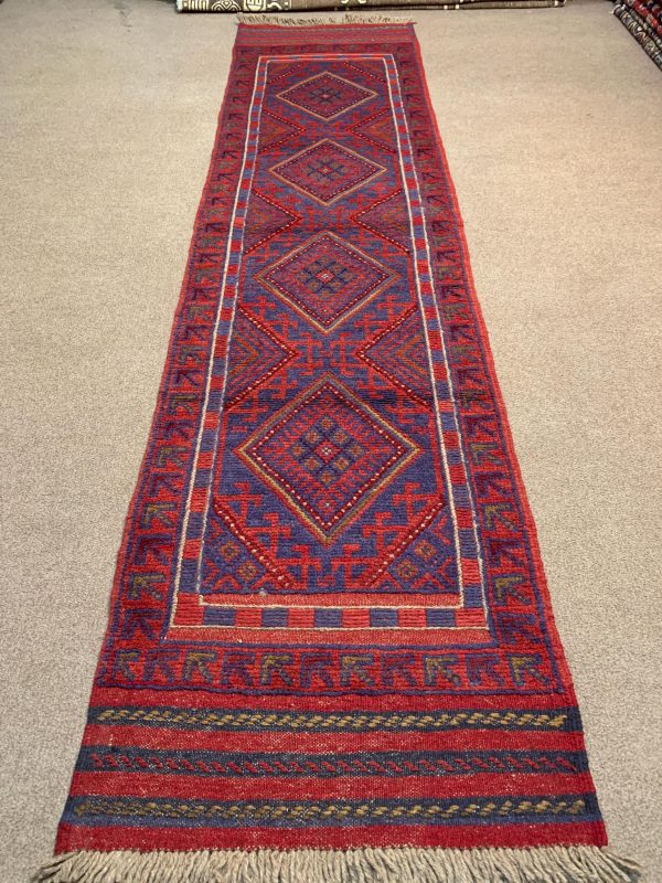 Vintage Afghan Handmade Wool Rug showing detailed red geometric patterns